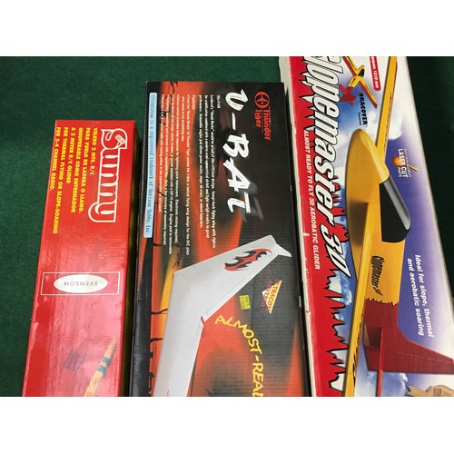 223 - Three boxed gliders/planes.