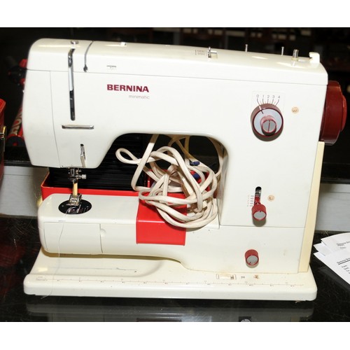 158 - Bernina sewing machine in case with foot pedal.