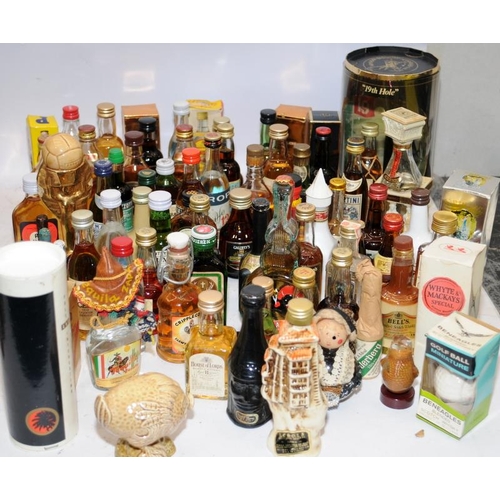 31 - A very large collection of vintage spirits miniatures including collectable examples. All seals inta... 