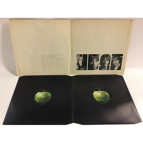 11 - THE BEATLES NUMBERED 'WHITE ALBUM'. No  0145549 early mono pressing with a top loader sleeve which w... 