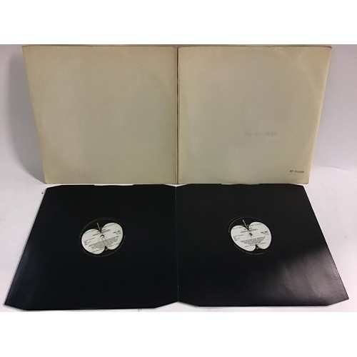 11 - THE BEATLES NUMBERED 'WHITE ALBUM'. No  0145549 early mono pressing with a top loader sleeve which w... 