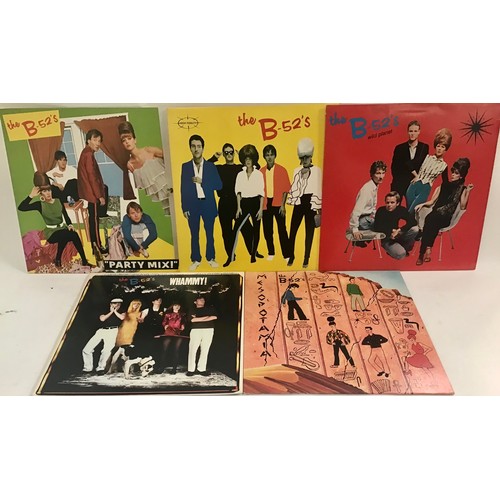 57 - 5 ALBUMS FROM THE B-52’S. This group of records include titles - Whammy - Party Mix - Mesopotamia - ... 