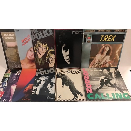 78 - ROCK / POP VINYL LP RECORDS. Nice bundle here to include Marc Bolan - The Clash - The Selecter - Dav... 