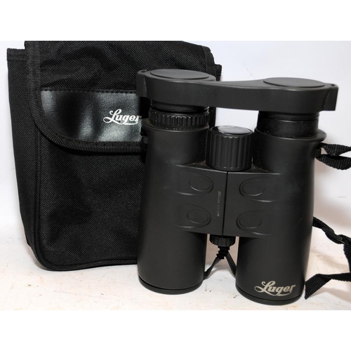 89 - A pair of Luger binoculars. (21)