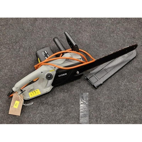 142 - Electric Titan chainsaw. (30)