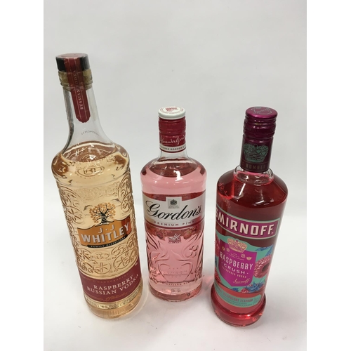 173 - A 1l bottle of Whitely Raspberry Vodka, 70cl Smirnoff rasberry crush and 70cl Gordons pink gin.(17)