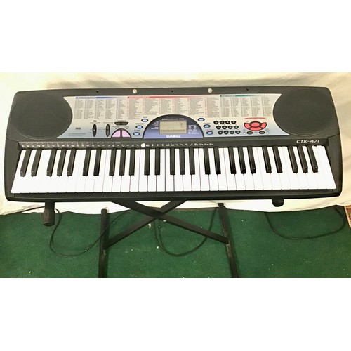 409 - CASIO KEYBOARD. This is model No. CTK-471 and comes complete with power supply and instruction/music... 