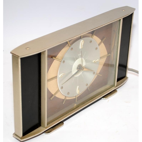 34 - Vintage 1960's Metamec electric clock. Presented in working condition