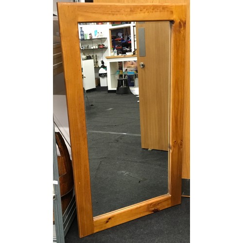 171 - Contemporary wooden framed mirror with bevelled edged glass 140x80cm.