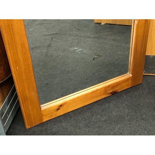 171 - Contemporary wooden framed mirror with bevelled edged glass 140x80cm.