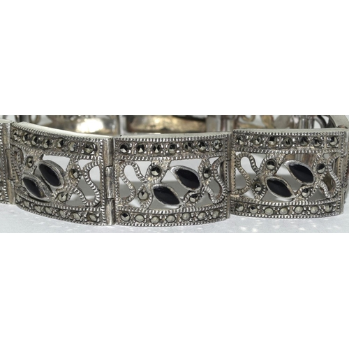 211 - Silver filigree design marcasite and jet bracelet