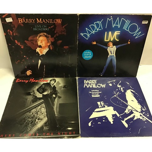 128 - COLLECTION OF VARIOUS BARRY MANILOW LP RECORDS. This case contains many of his albums that were pres... 