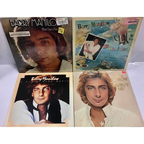 128 - COLLECTION OF VARIOUS BARRY MANILOW LP RECORDS. This case contains many of his albums that were pres... 