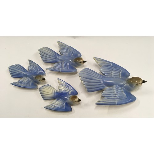 262 - Poole Pottery set of three wall hanging bluebirds together with one smaller spare (4)