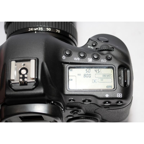 1 - Canon EOS-1D C DSLR camera with fitted Canon EF 24-105 1:4 zoom lens. With two batteries and a twin ... 