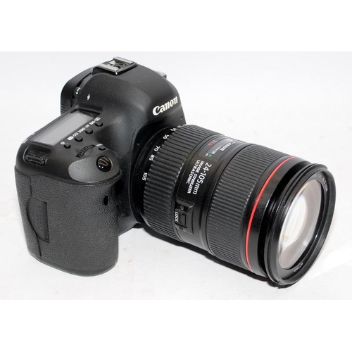 16 - Canon EOS 5d Mark III DSLR camera with fitted EF 24-105 1:4 zoom lens. Comes with battery and charge... 