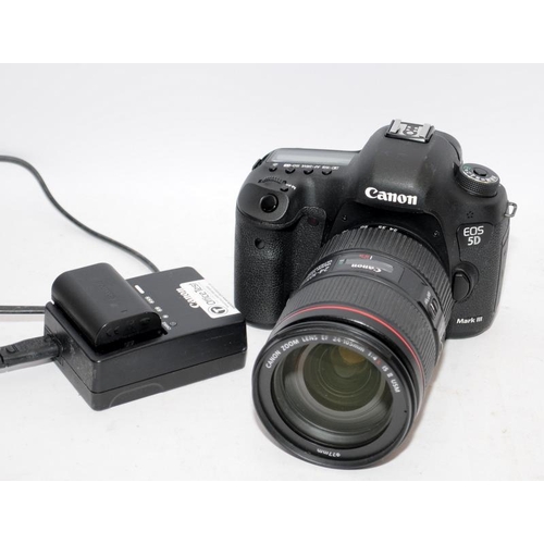 16 - Canon EOS 5d Mark III DSLR camera with fitted EF 24-105 1:4 zoom lens. Comes with battery and charge... 