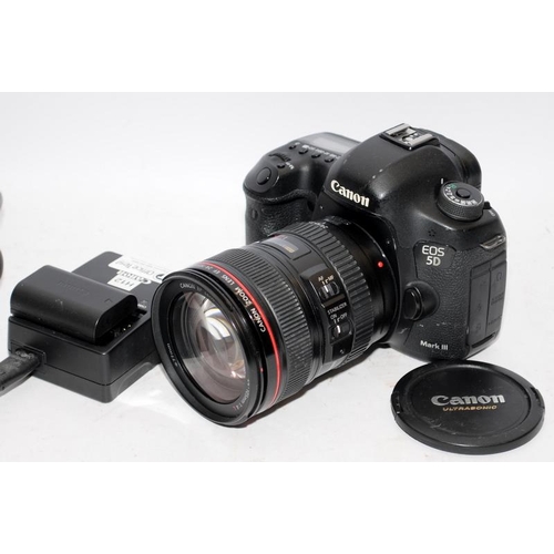 36 - Canon EOS 5d Mark III DSLR camera with fitted EF 24-105 1:4 zoom lens. Comes with battery and charge... 