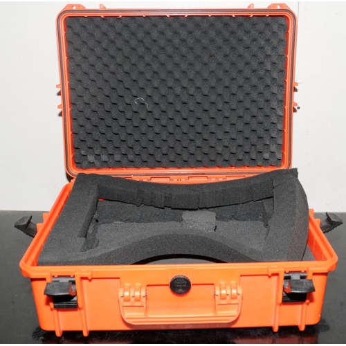 60 - Two large orange peli-cases with foam interior. 54cms x 42cms x 21cms