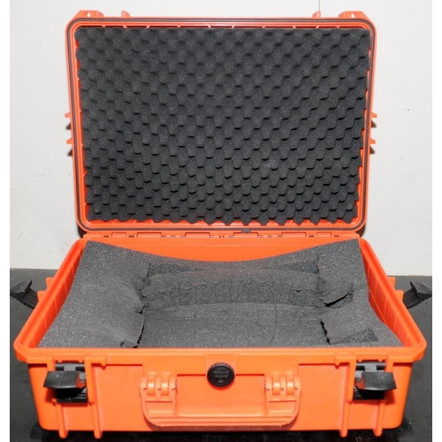 60 - Two large orange peli-cases with foam interior. 54cms x 42cms x 21cms