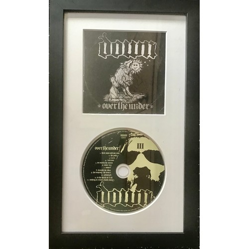 630 - DOWN ‘OVER THE UNDER’ SIGNED COMPACT DISC. This cd displayed in frame is signed in black ink by Jimm... 