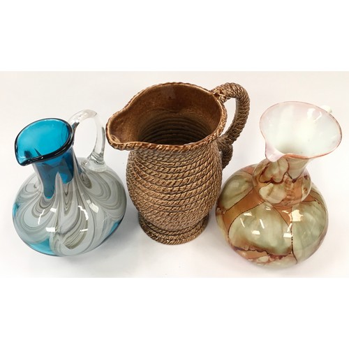 101 - Collection of jugs to include two glass examples and a ceramic rope effect (3).