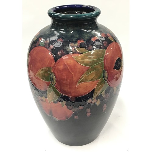 107 - An imposing large Moorcroft pottery pomegranate vase 42cm high, signed and stamped to base.