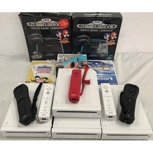 581 - VARIOUS GAME CONSOLES TO INCLUDE WII AND SEGA MEGADRIVE. Comes with Games, cables and controllers.