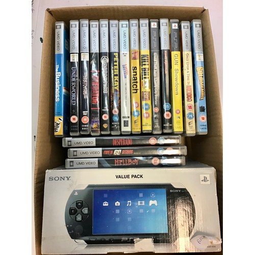 584 - SONY PSP PORTABLE PLAYSTATION AND GAMES. This box contains 17 boxed games along with a PSP complete ... 