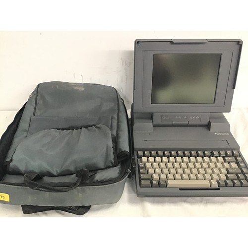 575 - TOSHIBA T3100e. This unit comes with a portable carry case.