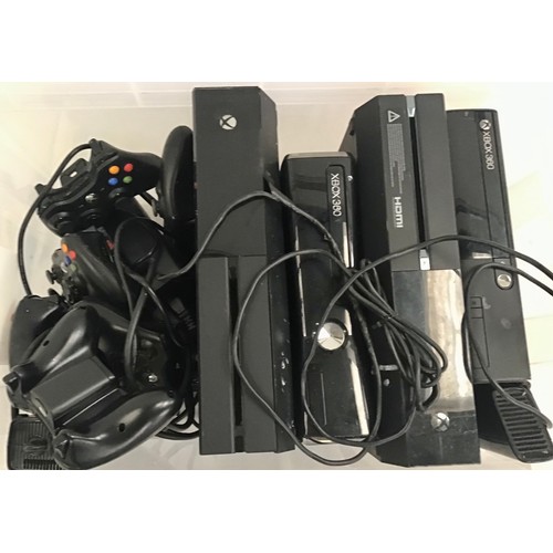 579 - BOX OF XBOX CONSOLES. This unit has 2 Xbox one’s and 2 Xbox 360’s together with cables and controlle... 