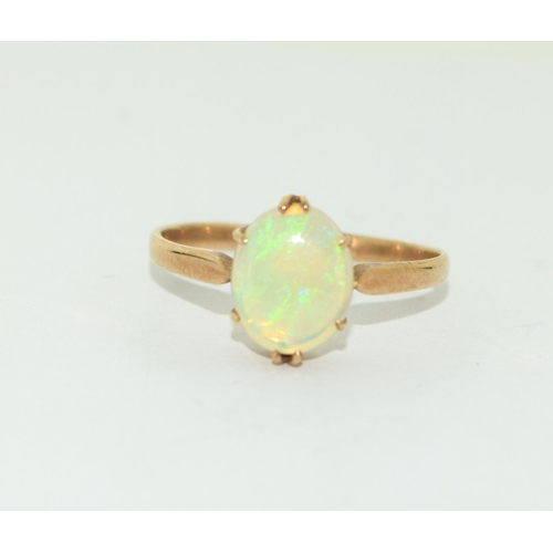 458 - 9ct gold ladies Vintage Opal solitaire ring the Opal being cabochon cut size U