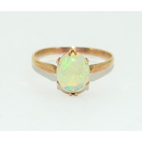 458 - 9ct gold ladies Vintage Opal solitaire ring the Opal being cabochon cut size U