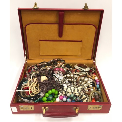 42 - A briefcase containing costume jewellery.