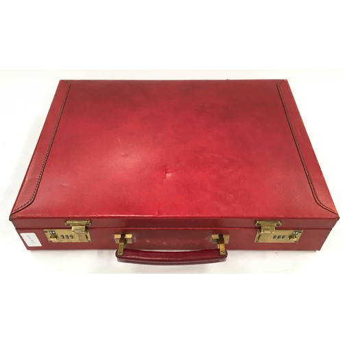 42 - A briefcase containing costume jewellery.