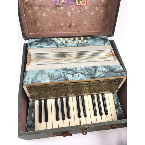 139 - Two vintage accordions one in original case.