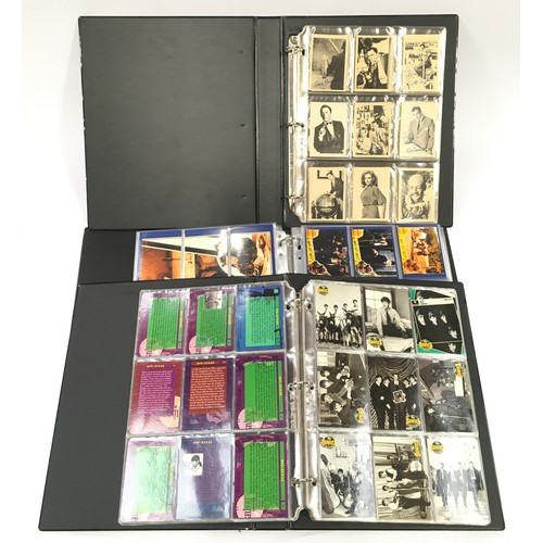 48 - Collection of mainly Laurel & Hardy collectables to include toys, figures and trading card sets.