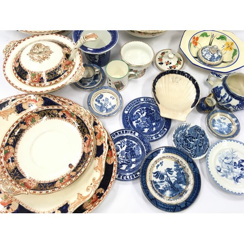 87 - Mixed chinaware to include Booths and Blue/White willow pattern pieces some by Royal Doulton.