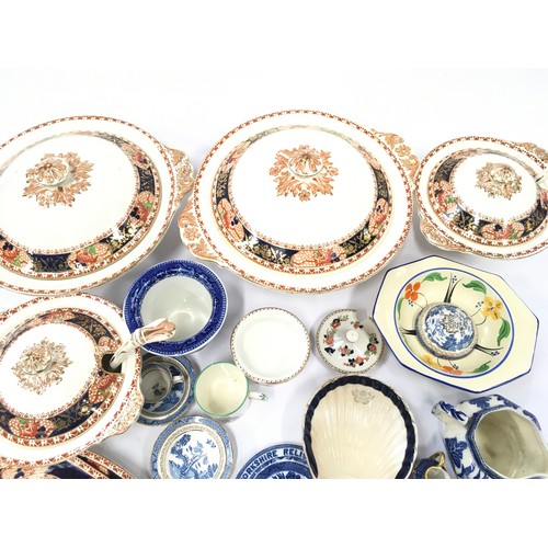 87 - Mixed chinaware to include Booths and Blue/White willow pattern pieces some by Royal Doulton.