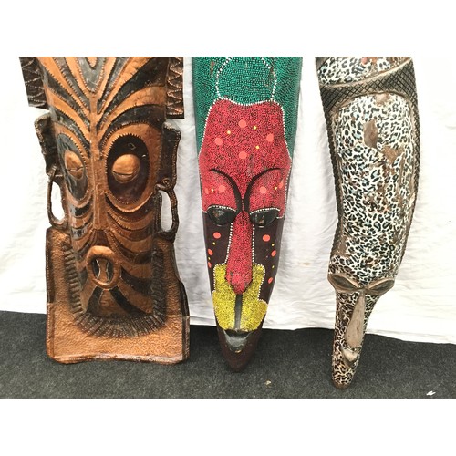 63 - Three African tribal art masks.