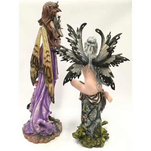 71 - Two Nemesis Now mythical figurines the largest measuring 63cm tall.