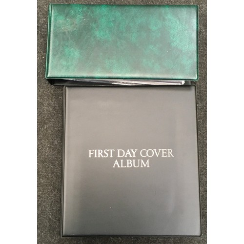 174 - Two books of first day covers.