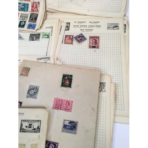 175 - Schoolboy stamp collection. Good collection of world stamps in an album and loose sheets.