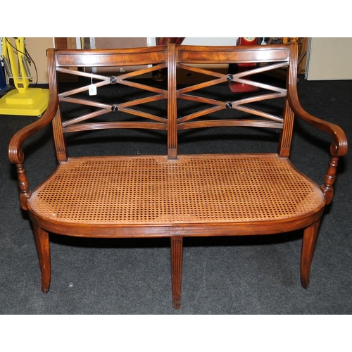 474 - A reproduction mahogany settle with cane seat 90x123x50cm