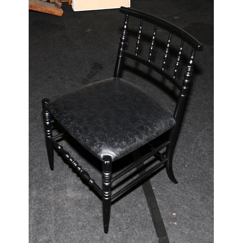 476 - A set of six black Italian designer dining chairs.