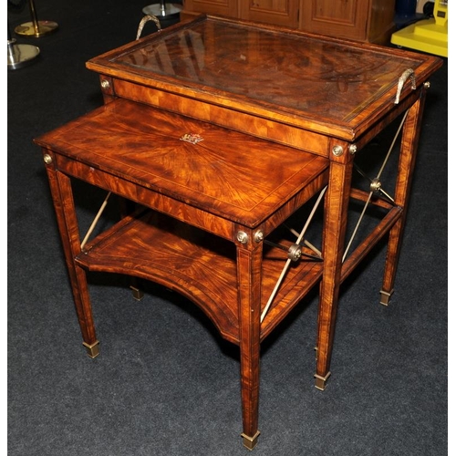 482 - A Neoclassical style burr walnut veneer table featuring classical tapered legs with brass feet and a... 