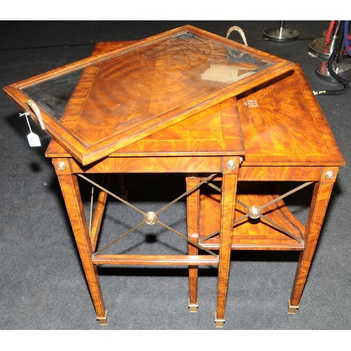 482 - A Neoclassical style burr walnut veneer table featuring classical tapered legs with brass feet and a... 