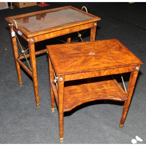 482 - A Neoclassical style burr walnut veneer table featuring classical tapered legs with brass feet and a... 