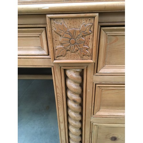 459 - Solid pine desk having 3 side draws and centre draw with turned decoration and carved motifs 85x155x... 