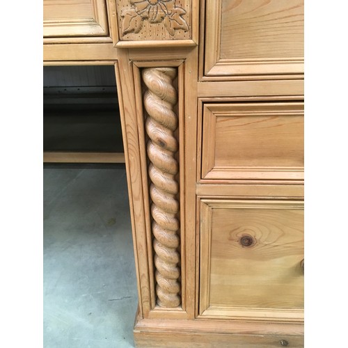 459 - Solid pine desk having 3 side draws and centre draw with turned decoration and carved motifs 85x155x... 